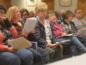 People sitting in the front row at the Stop & Shop workers UFCW 1459 contract ratification.
